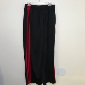 Black and  red adidas men’s track pants